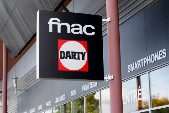 Darty Fnac Logo on building facade shop on facade sign store in street