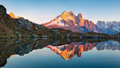 Attractive autumn view of Cheserys lake with Mount Blank on background, Chamonix location. Gorgeous...