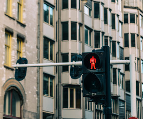 Traffic lights for pedestrian showing the red
