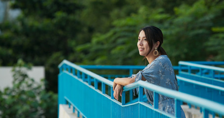 Woman look around the view in the park