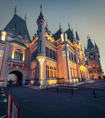 Wonderful night view of Cultural Palace Iasi. Great summer cityscape of Iasi town, capital of  Moldavia region, Romania, Europe. Architecture traveling background.