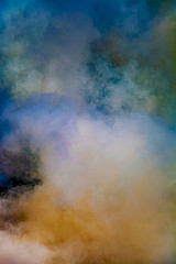 Colorful natural smoke on black background
