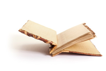 Open notebook lies on white background