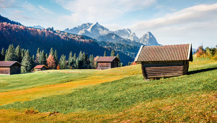 Colorful morning scene of Zugspitze mountain range, Wagenbruchsee (Geroldsee) lake lacation. Beautiful autumn view of Bavarian Alps, Germany, Europe. Beauty of nature concept background.
