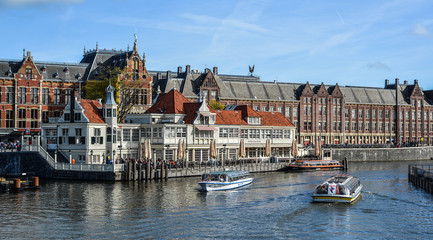 Fototapeta na wymiar Canals of the Amsterdam city
