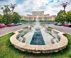 Gorgeous summer view of Palace of the Parliament. Picturesque morning cityscape of Bucharest city - Romania, Europe. Traveling concept background.