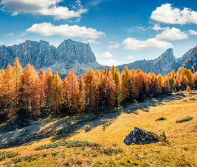 Wonderful morning view from the top of Giau pass. Sunny autumn landscape in Dolomite Alps, Cortina d'Ampezzo location, Italy, Europe. Beauty of nature concept background.