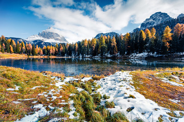 Splendid frosty scene of Antorno lake with Tre Cime di Lavaredo (Drei Zinnen) mount. Colorful autumn landscape in Dolomite Alps, Province of Belluno, Italy, Europe. 