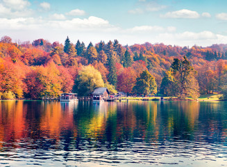 Excursion ships on the lake. Picturesque autumn view of Plitvice lake. Bright morning landscape of Croatia, Europe. Traveling concept background.