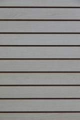 Horizontally layed wooden planks' surface of gray color