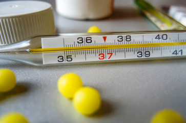 Thermometer for measuring body temperature in case of illness against the background of drugs,...
