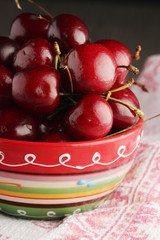 A bowl with ripe cherry