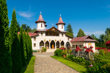 Fototapeta na wymiar Crasna, Prahova, Romania - July 21, 2019: Front view of the Crasna Monastery near Izvoarele, Prahova.