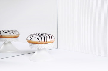 Striped donuts on a white background.