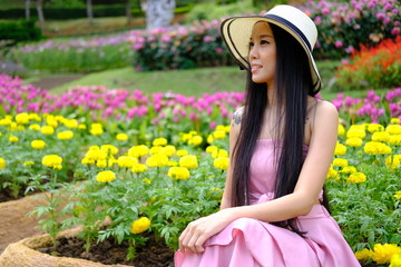 young woman in the flower garden