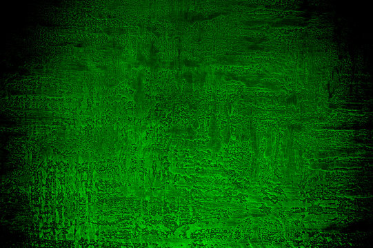 Abstract textured decorative stucco background in green colors.