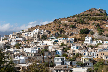 Obraz premium Agios Stefanos, Crete, Greece. September 2019. The mountainside ancient village of Agios Stefanos one of the oldest in Crete.