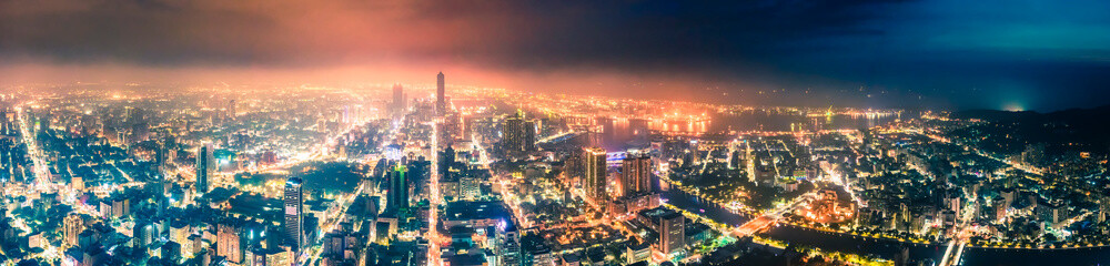 Fototapeta premium Aerial panoramic view of kaohsiung city skyline at night. Taiwan