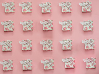 Gift pattern on pink background