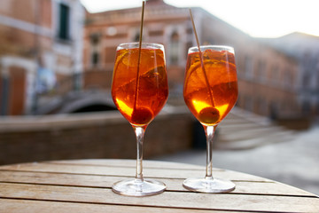 Two glasses of spritz on table