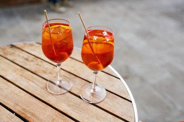 Two glasses of spritz on table