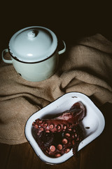 Octopus. Seafood in the restaurant. Octopus is prepared in the restaurant on the table.