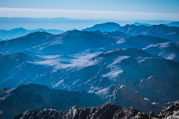 Blue night arid desert landscape with mountains silhouette Sinai, Egypt