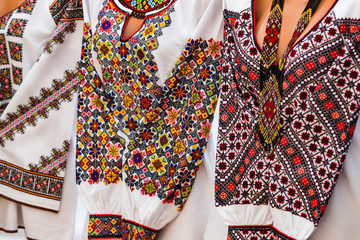 Traditional Ukrainian clothing embroidered with colored women’s in men's shirts of embroidered shirt.