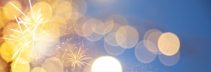christmas or new year banner with bokeh lights and fireworks