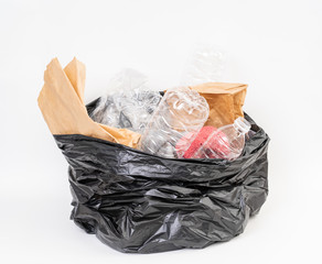 Trash bag with recycle garbage on white background