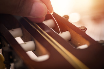 restring classical guitar