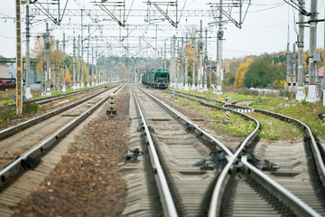 Fototapeta na wymiar freight train at the station with rails and arrows