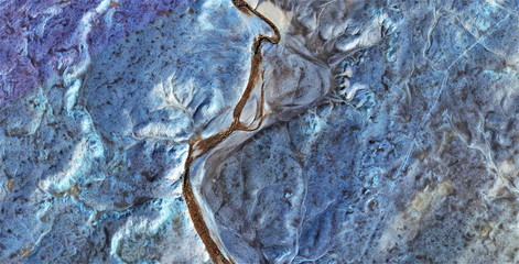cold explosion, abstract photography of the deserts of Africa from the air. aerial view of desert landscapes, Genre: Abstract Naturalism, from the abstract to the figurative, contemporary photo