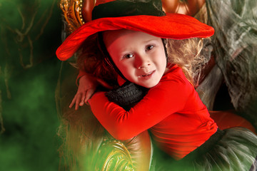 little witch in a red dress