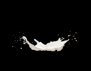 Splashes of milk or white liquid on a black background