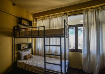 Hostel dormitory beds at cheap room