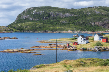 Fototapeta na wymiar Traditional salt box houses in the fishing village of Salvage, Newfoundland&Labrador, Canada