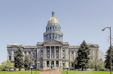 Obraz premium The Colorado State Capitol, opened in 1894, was built with Colorado white granite and has real gold leaf on the dome. The building is listed on the National Register of Historic Places.
