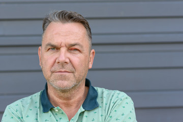 Obraz premium Middle-aged man with swollen inflamed eye