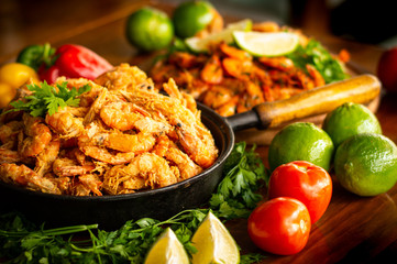crispy fried prawns snacks served in iron pan