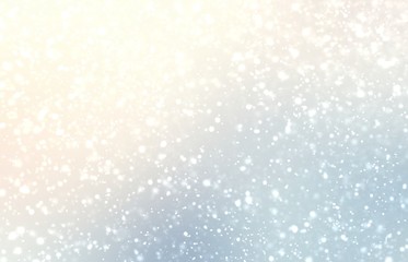 Naklejka na ściany i meble Thick snowfall on light defocus background. Shiny winter illustration. Fluffy snow pattern. Delicate yellow blue pastel blur backdrop.