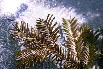 Christmas card. Golden Christmas tree close-up for design postcards. Beautiful bokeh.