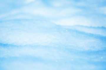Obraz premium Winter christmas background. Snowflakes in the soft white snow. Winter background.