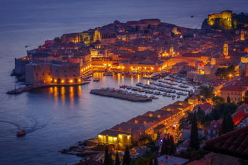 Illuminated old port Dubrovnik at night