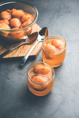 Kanji Vada / wada is a popular Rajasthani detoxifying dish consumed after over eating of sweets in Indian festival season. served in transparent Bowl or glass