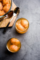 Kanji Vada / wada is a popular Rajasthani detoxifying dish consumed after over eating of sweets in Indian festival season. served in transparent Bowl or glass