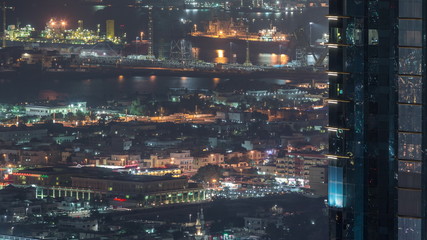 Aerial view from Downtown of Dubai to port night timelapse