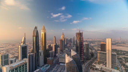 Fototapeta na wymiar Skyline view of the buildings of Sheikh Zayed Road and DIFC aerial timelapse in Dubai, UAE.