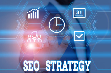 Writing note showing Seo Strategy. Business concept for procedures that aim to increase the visibility of a website Male wear formal work suit presenting presentation smart device