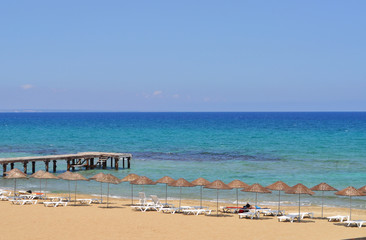 Fototapeta na wymiar beach and sea, Cyprus, incredibly blue sea, Mediterranean Sea, boat mooring